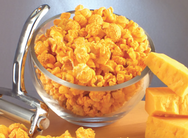 A bowl of Cheesy Cheddar popcorn, a popular popcorn fundraising option