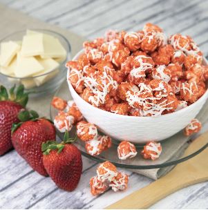 A bowl of Strawberry Shortcake popcorn, a sweet and delicious popcorn fundraiser flavor. 