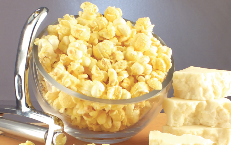 A bowl of White Cheddar popcorn, a delicious popcorn fundraiser flavor.